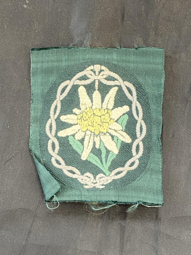 WW2 GERMAN BEVO WOVEN EDELWEISS BADGE