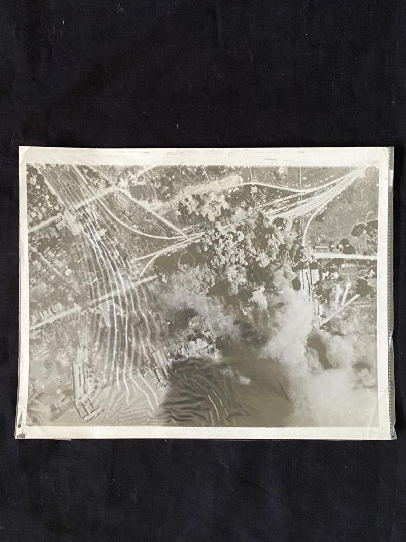 PHOTO OF THE U.S. BOMBS BLAST JAPANESE HELD SUPPLY CENTRE IN BURMA